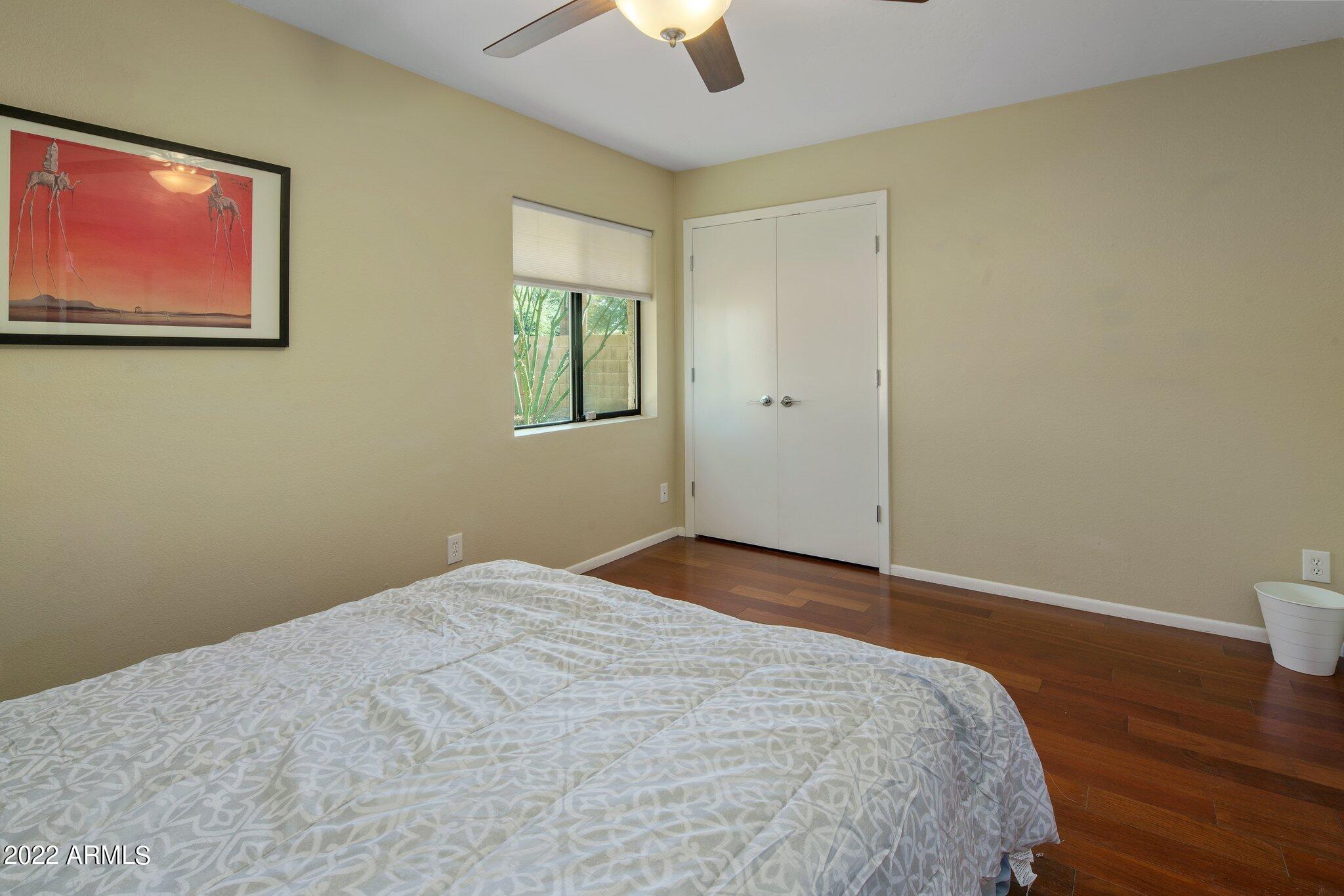 6609 East Phelps Road Scottsdale, AZ 85254 - Photo 63 of 83 a bedroom with a bed and a window