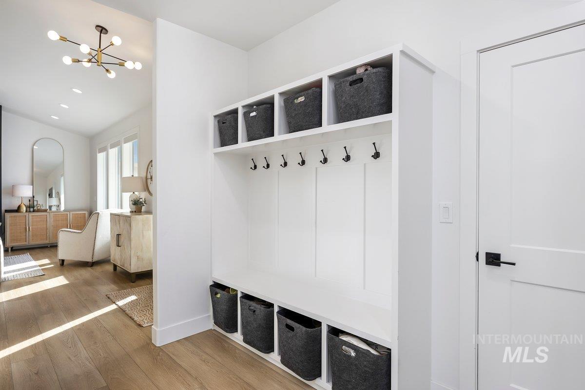 1046 Northridge Way Kimberly, ID 83341 - Photo 11 of 24 Mudroom featuring wood finished floors and hanging lights