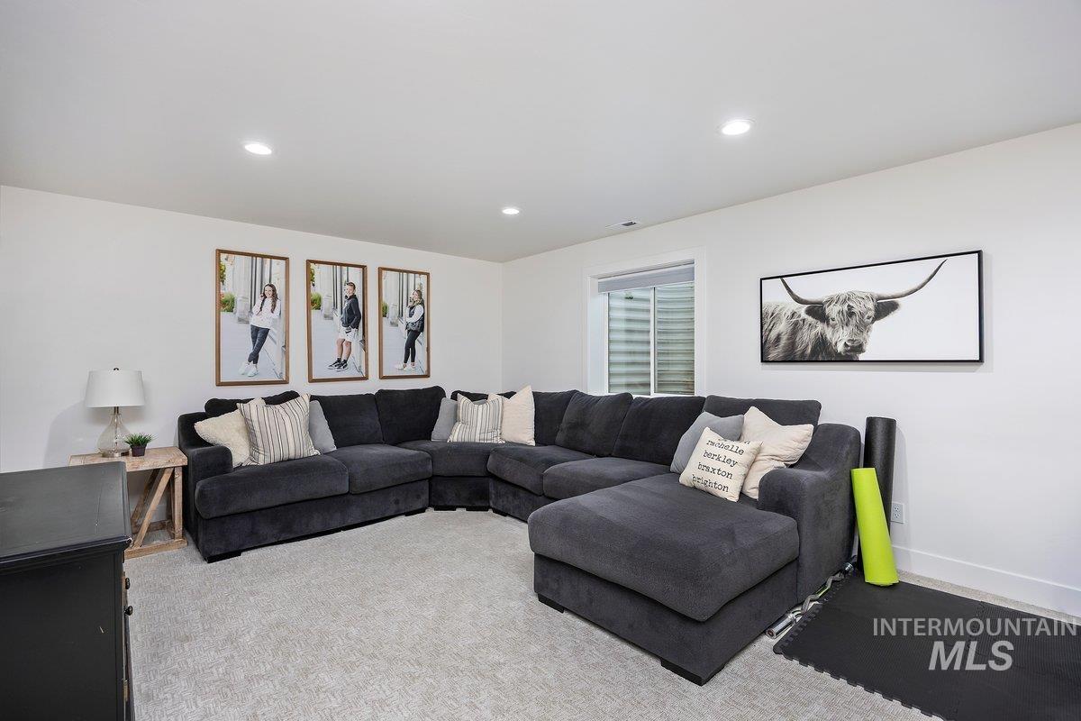 1046 Northridge Way Kimberly, ID 83341 - Photo 12 of 24 Carpeted living area with recessed lighting
