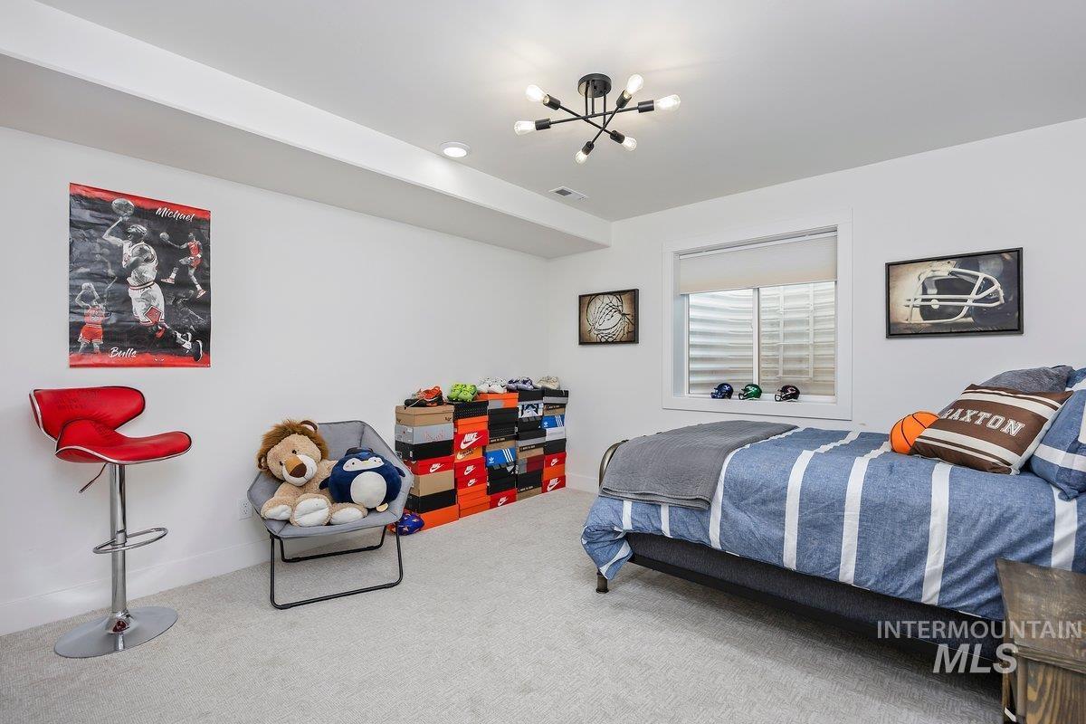 1046 Northridge Way Kimberly, ID 83341 - Photo 17 of 24 Carpeted bedroom featuring baseboards and suspended lighting