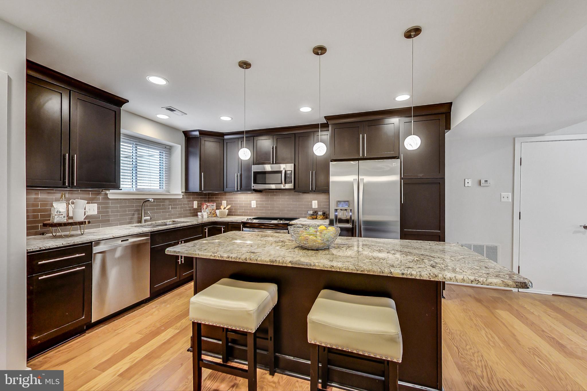 8917 Battery Place, Unit 26 Bethesda, MD 20814 - Photo 1 of 31 Stunning Two-Level Condo in Downtown Bethesda!