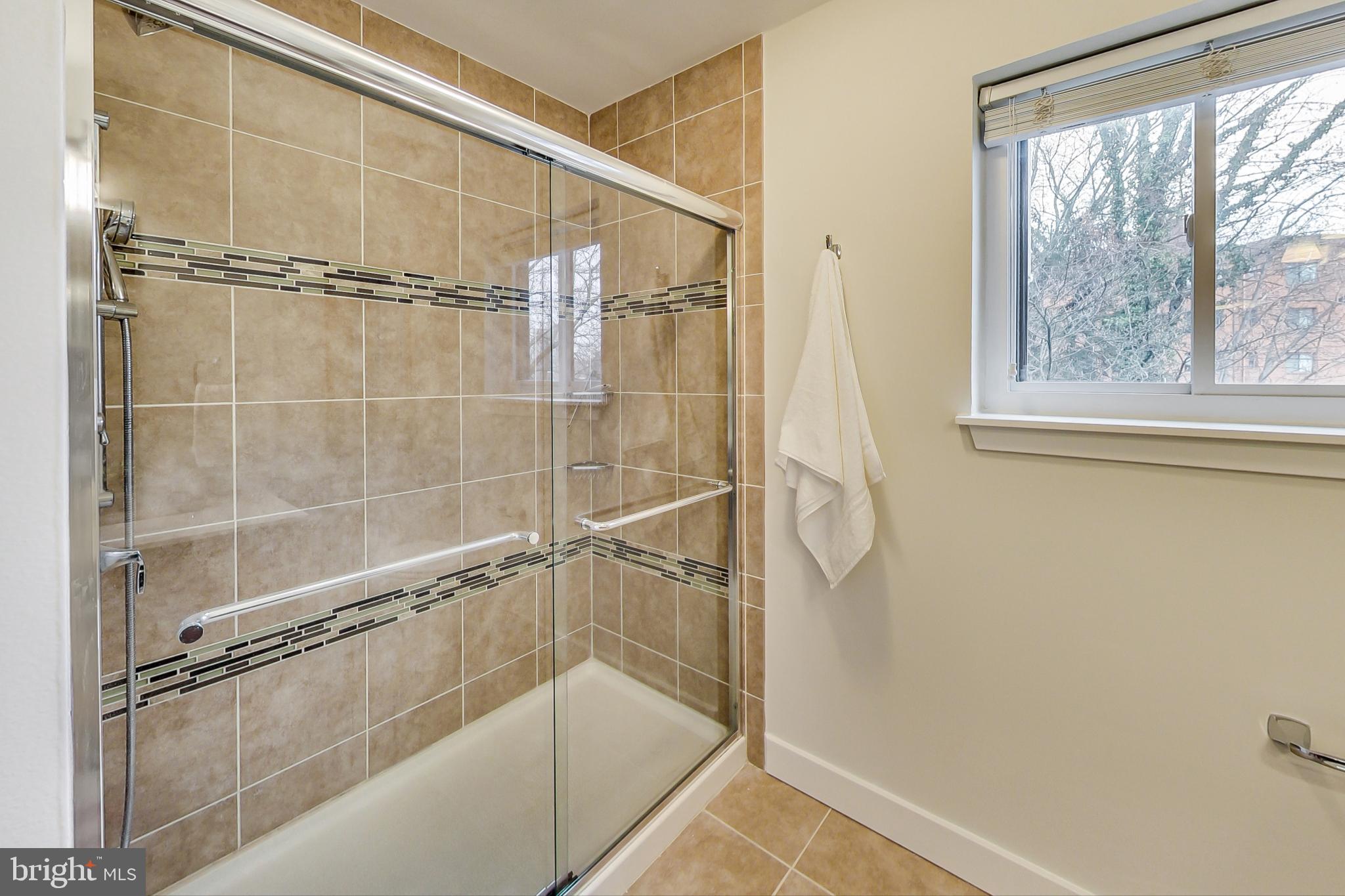 8917 Battery Place, Unit 26 Bethesda, MD 20814 - Photo 16 of 31 Renovated Shower in Primary Bathroom