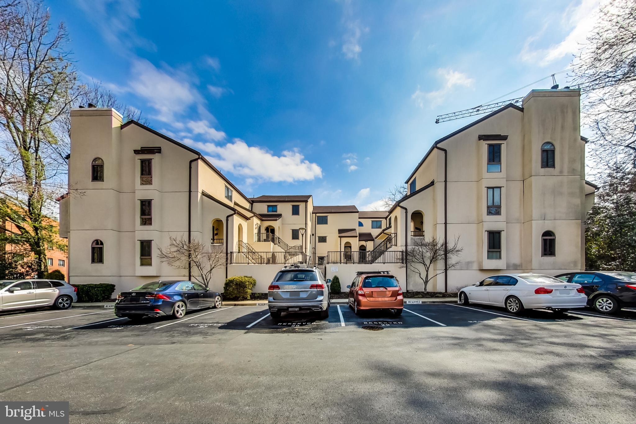 8917 Battery Place, Unit 26 Bethesda, MD 20814 - Photo 26 of 31 Parking Lot with Reserved Spot #33 + Visitor Spots