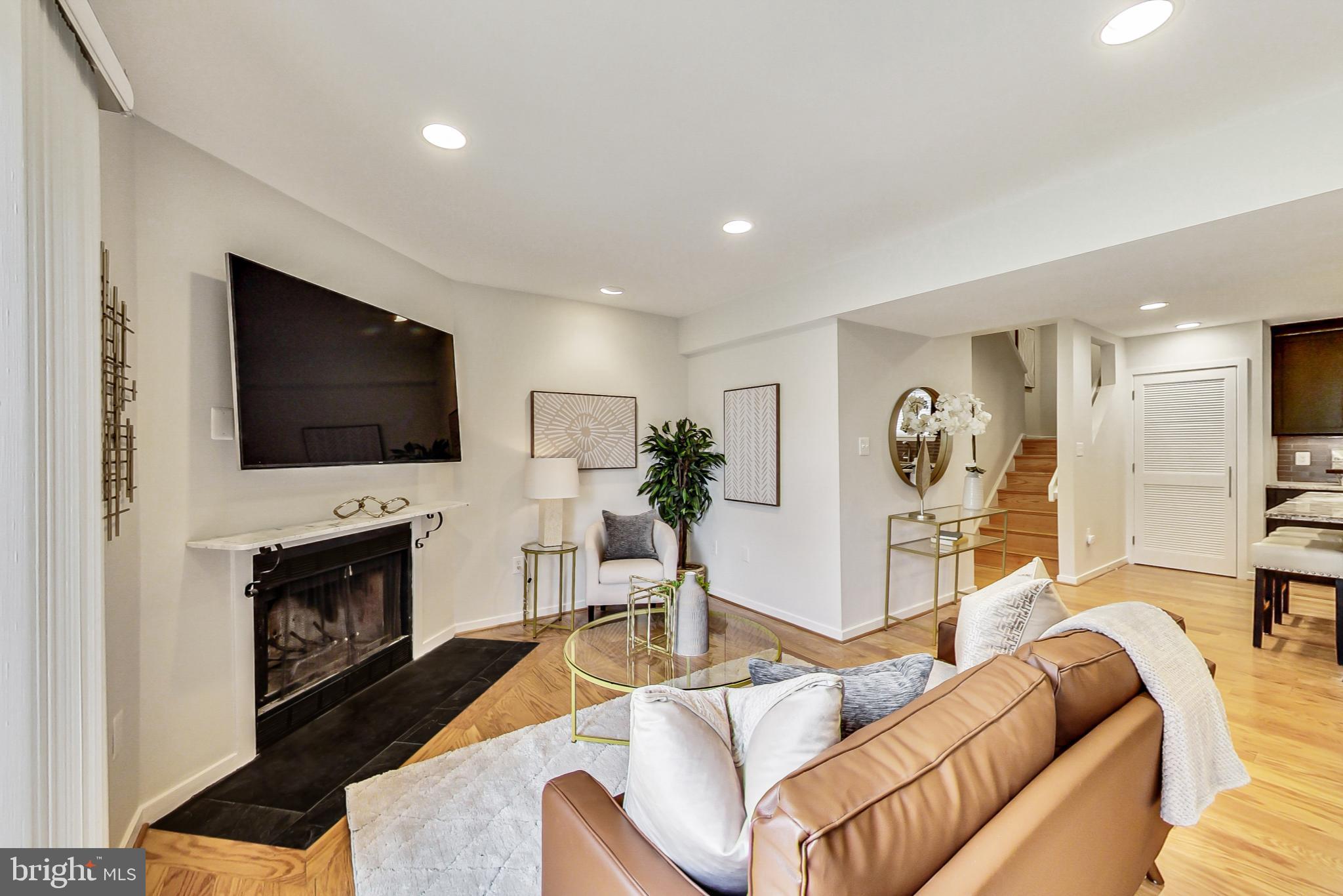 8917 Battery Place, Unit 26 Bethesda, MD 20814 - Photo 5 of 31 Spacious Living Room with Fireplace