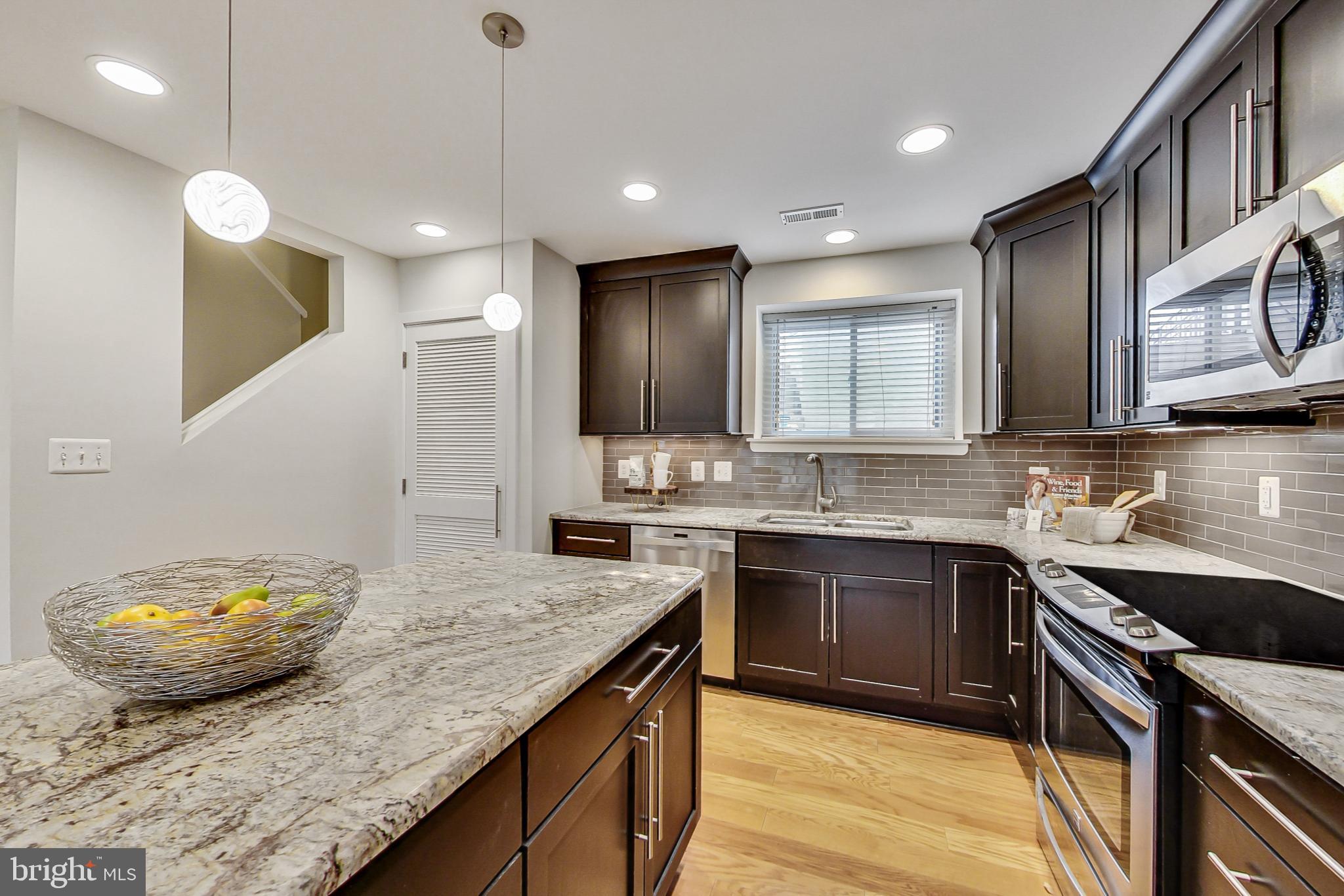 8917 Battery Place, Unit 26 Bethesda, MD 20814 - Photo 9 of 31 Stone Counters & Huge Island