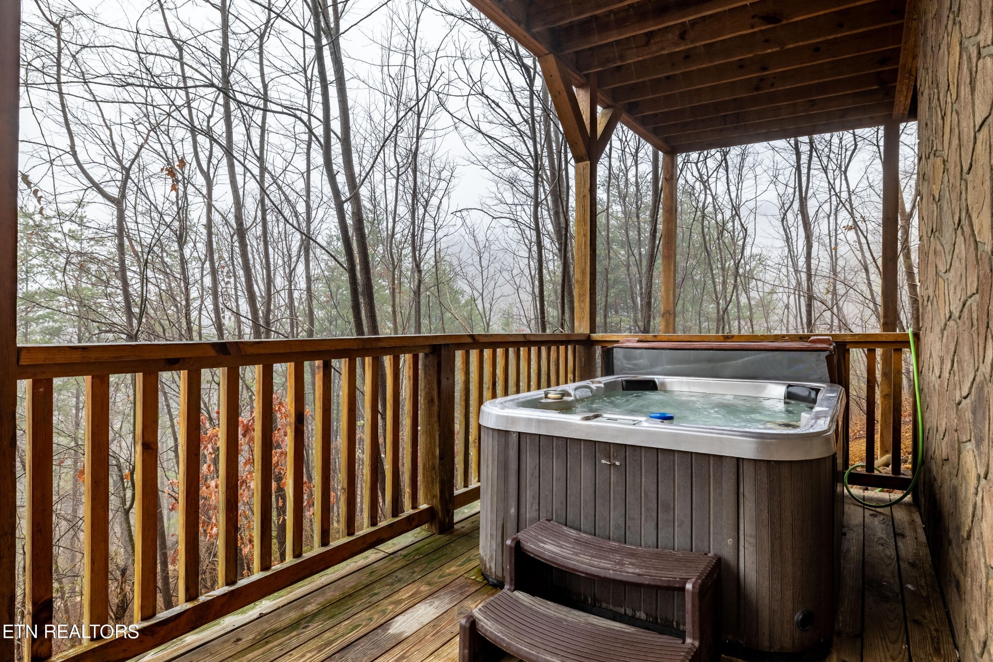 2149 Rising Fawn Way Sevierville, TN 37862 - Photo 50 of 50 a bathroom with a sink a mirror and next to a window