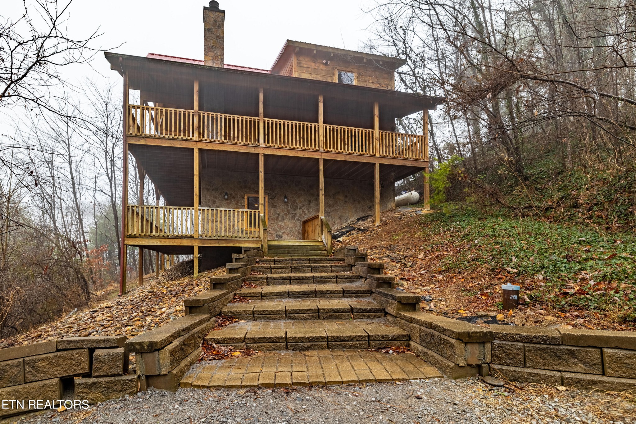 2149 Rising Fawn Way Sevierville, TN 37862 - Photo 9 of 50 a front view of a house with a yard