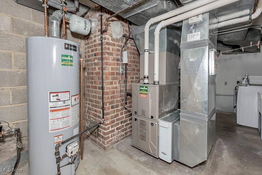 14711 South Woodland Road Cleveland, OH 44120 - Photo 27 of 31 The Utility Side of the Lower-Level Basement Includes Space for a Laundry Pair (included in the house sale) and Other Utilities, like the HVAC Unit and Water Heater.