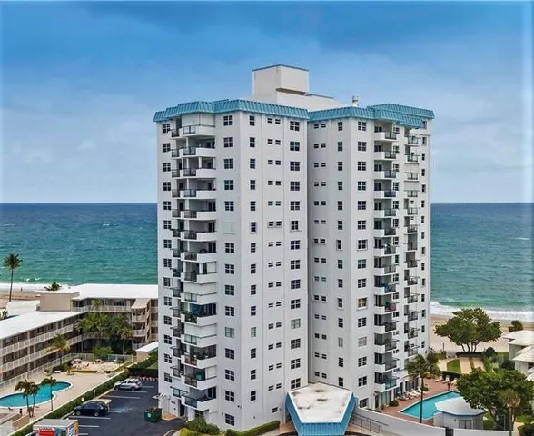 a view of street with sitting area