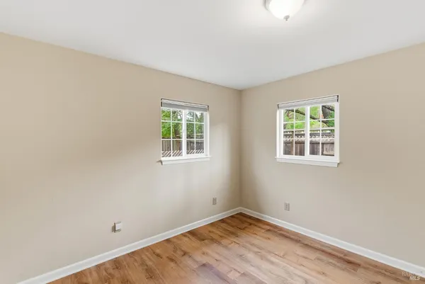 a view of kitchen with wooden floor