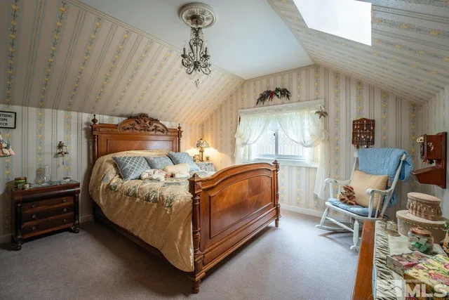 a bathroom with a sink a vanity and a mirror