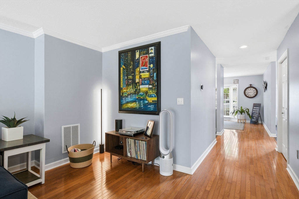 38 Shady Brook, Unit 38 West Springfield, MA 01089 - Photo 21 of 41 a living room with furniture and a wooden floor