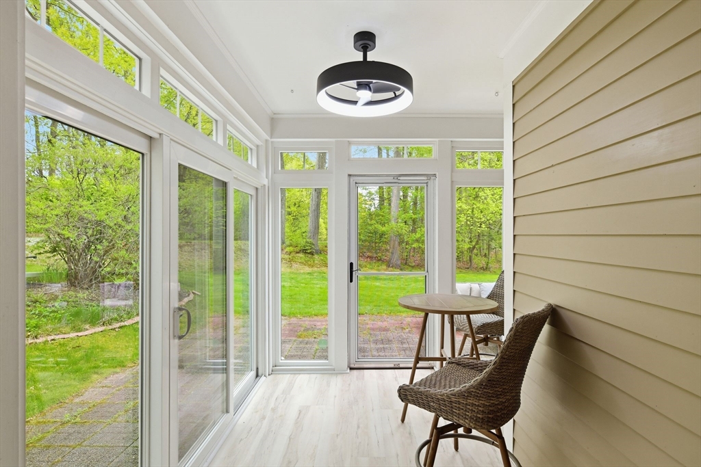 38 Shady Brook, Unit 38 West Springfield, MA 01089 - Photo 23 of 41 a view of a dining room with furniture window and outside view
