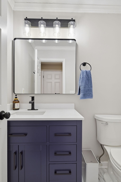 38 Shady Brook, Unit 38 West Springfield, MA 01089 - Photo 25 of 41 a bathroom with a toilet sink and mirror