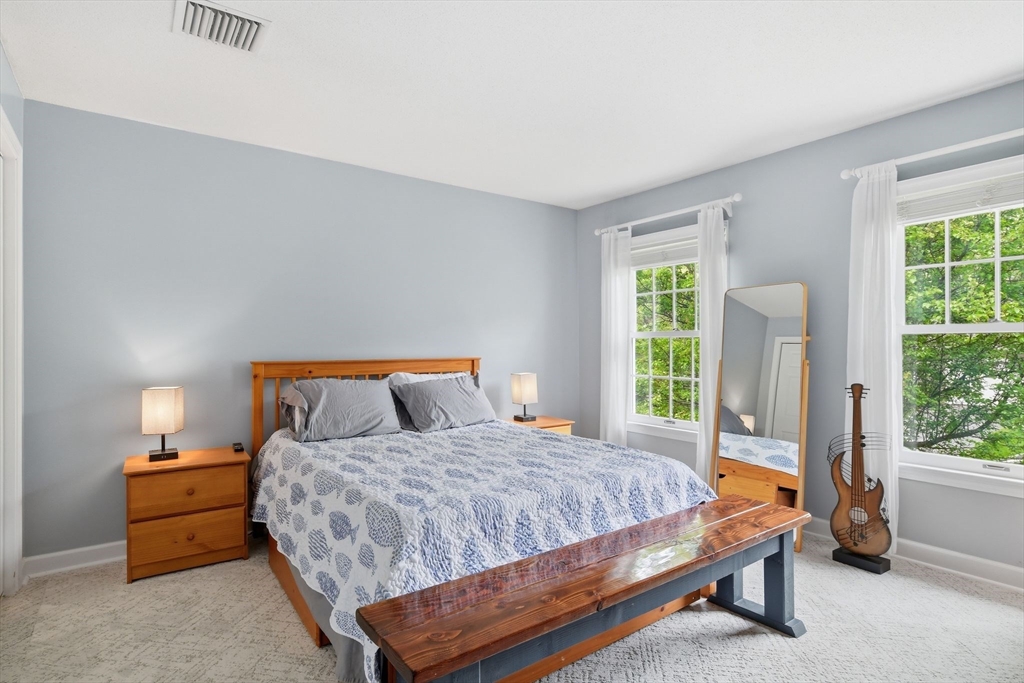 38 Shady Brook, Unit 38 West Springfield, MA 01089 - Photo 31 of 41 a bedroom with a bed and a window