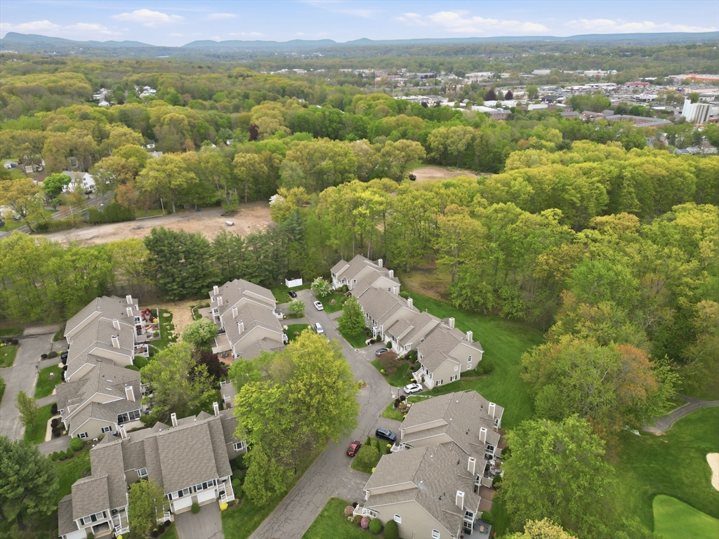 38 Shady Brook, Unit 38 West Springfield, MA 01089 - Photo 6 of 41 an aerial view of a house with a garden