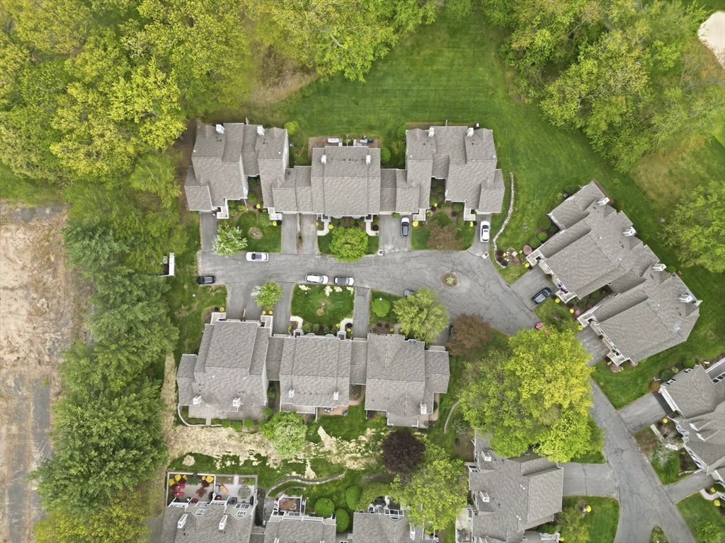 38 Shady Brook, Unit 38 West Springfield, MA 01089 - Photo 7 of 41 an aerial view of a house with yard and outdoor seating