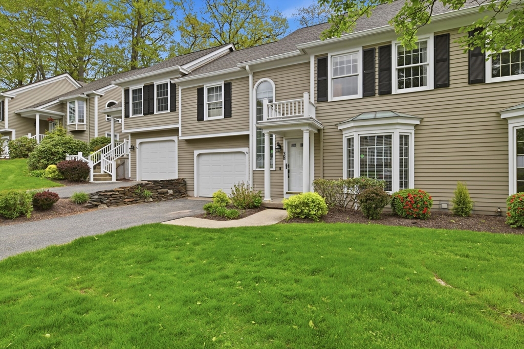 38 Shady Brook, Unit 38 West Springfield, MA 01089 - Photo 8 of 41 a front view of a house with garden and porch