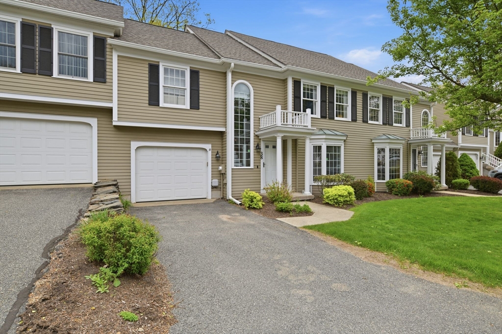 38 Shady Brook, Unit 38 West Springfield, MA 01089 - Photo 10 of 41 front view of a house with a yard