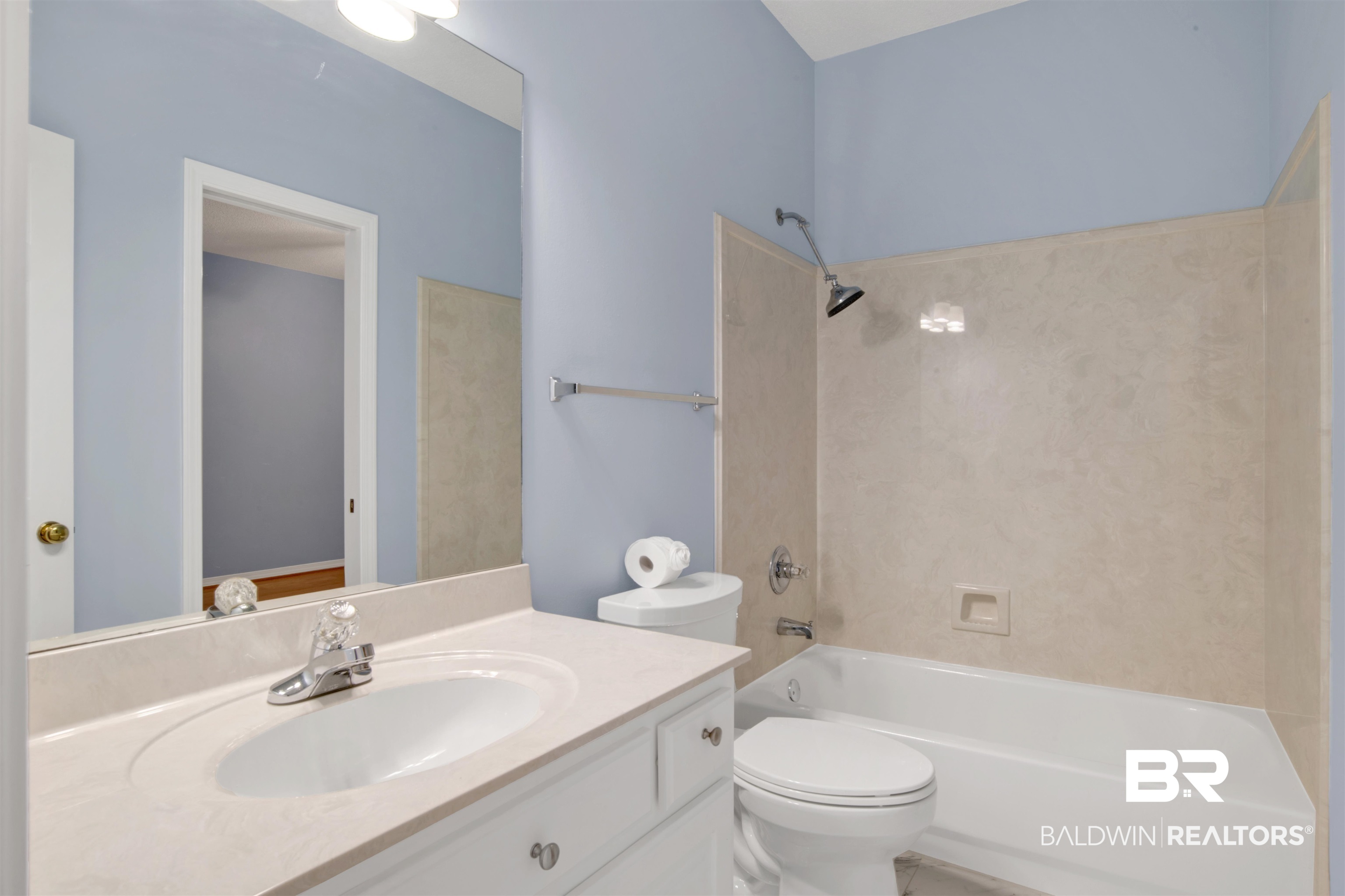 125 Woodruff Court Mobile, AL 36608 - Photo 22 of 27 Full bathroom with vanity, toilet, and tiled shower / bath combo