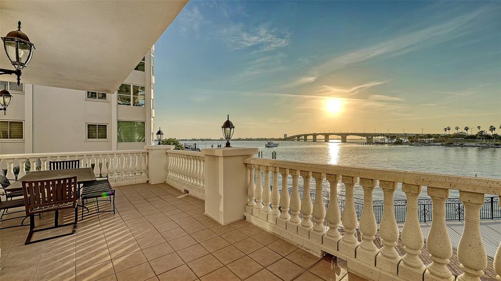 166 Golden Gate Point, Unit 22 Sarasota, FL 34236 - Photo 36 of 51 a view of a balcony with chairs