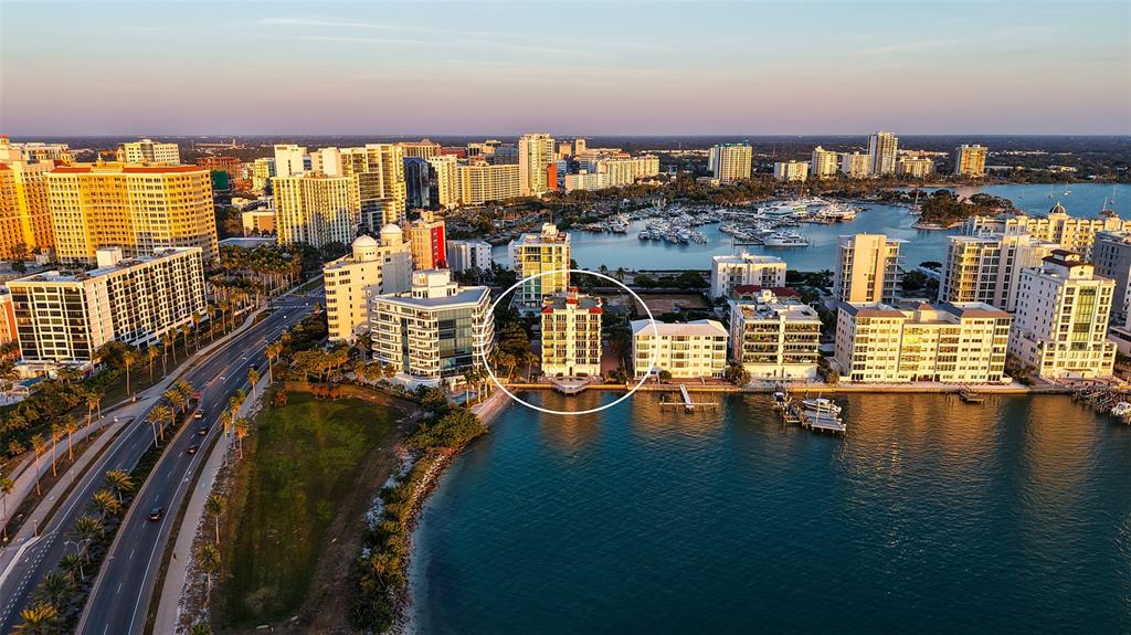 166 Golden Gate Point, Unit 22 Sarasota, FL 34236 - Photo 4 of 51 a view of a balcony with chairs