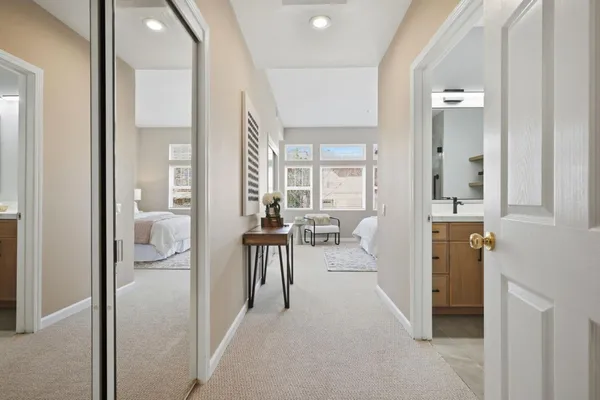a bedroom with a bed and a couch