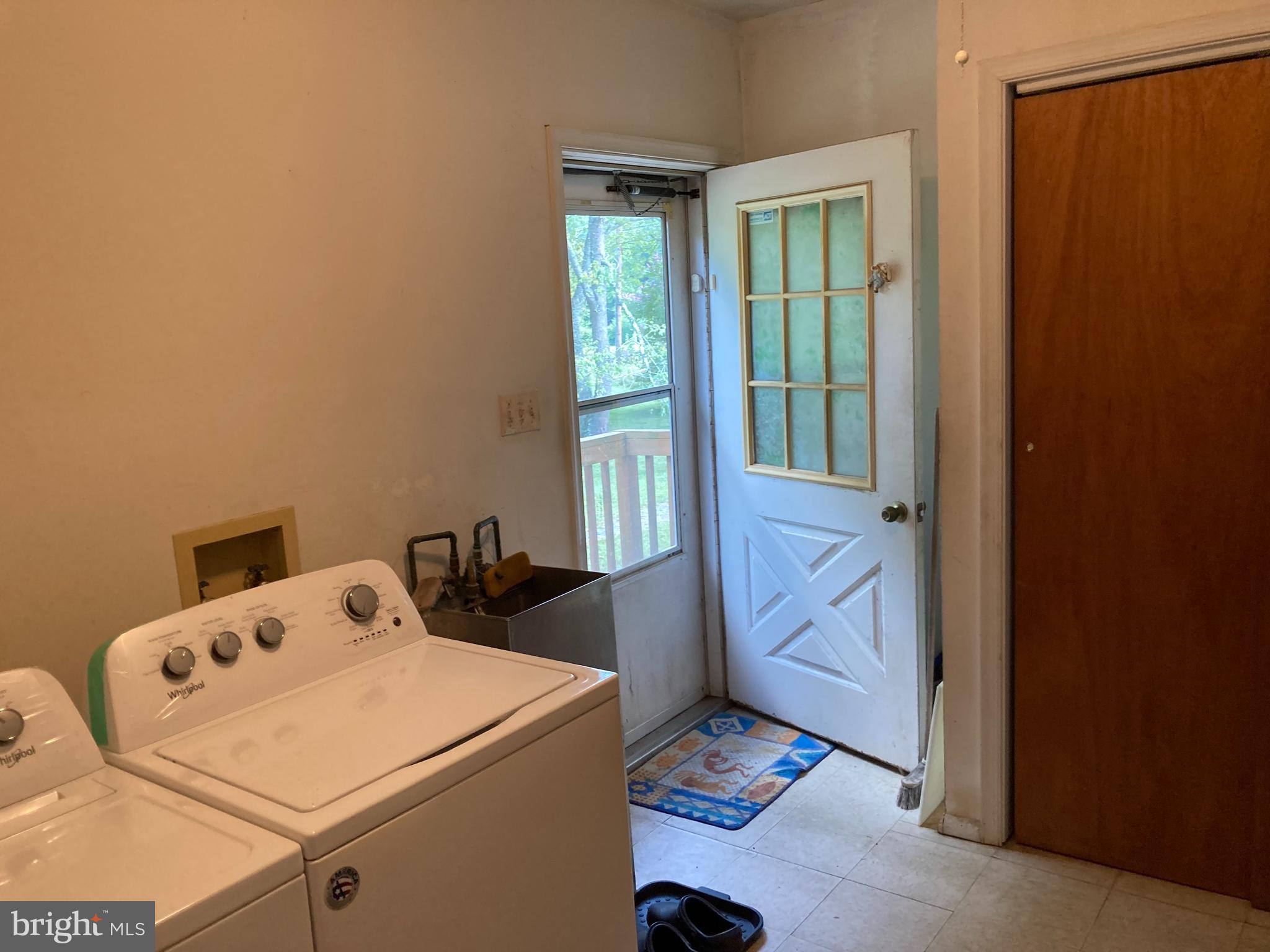 9811 Piscataway Road Clinton, MD 20735 - Photo 8 of 33 Laundry room with outside entrance
