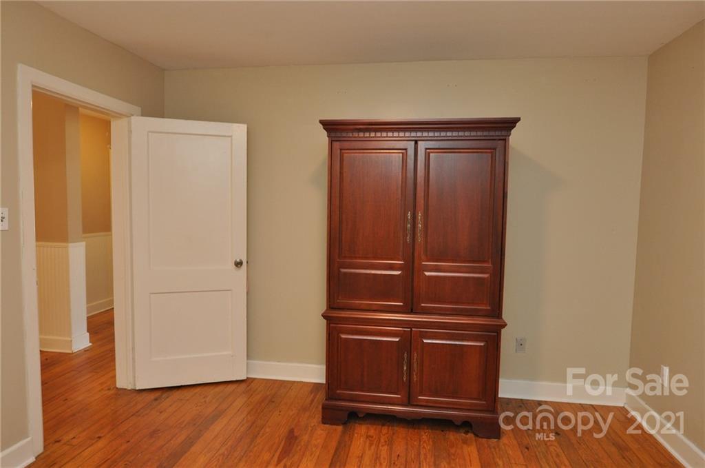 623 Sanders Street Chester, SC 29706 - Photo 16 of 20 a area with wooden floor and closet