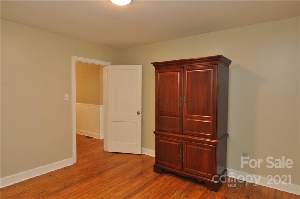 623 Sanders Street Chester, SC 29706 - Photo 17 of 20 a view of empty room with wooden floor