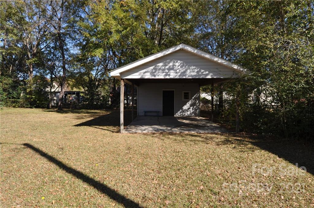 623 Sanders Street Chester, SC 29706 - Photo 18 of 20 a view of a house with a yard