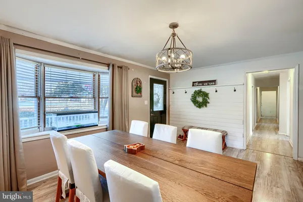 a view of a livingroom with furniture and window