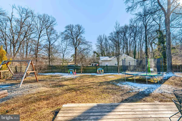 a view of a house with basketball court
