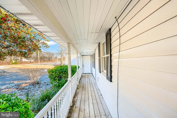 a view of a house with brick walls