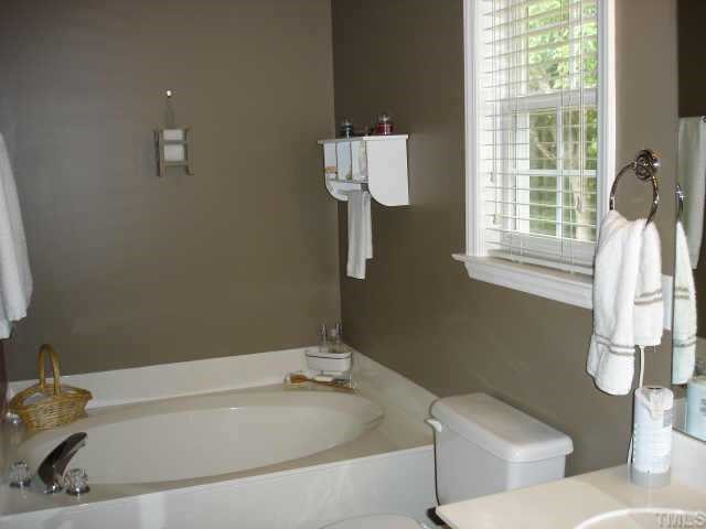 3521 Boren Court Raleigh, NC 27616 - Photo 7 of 10 a bathroom with a sink and a bathtub