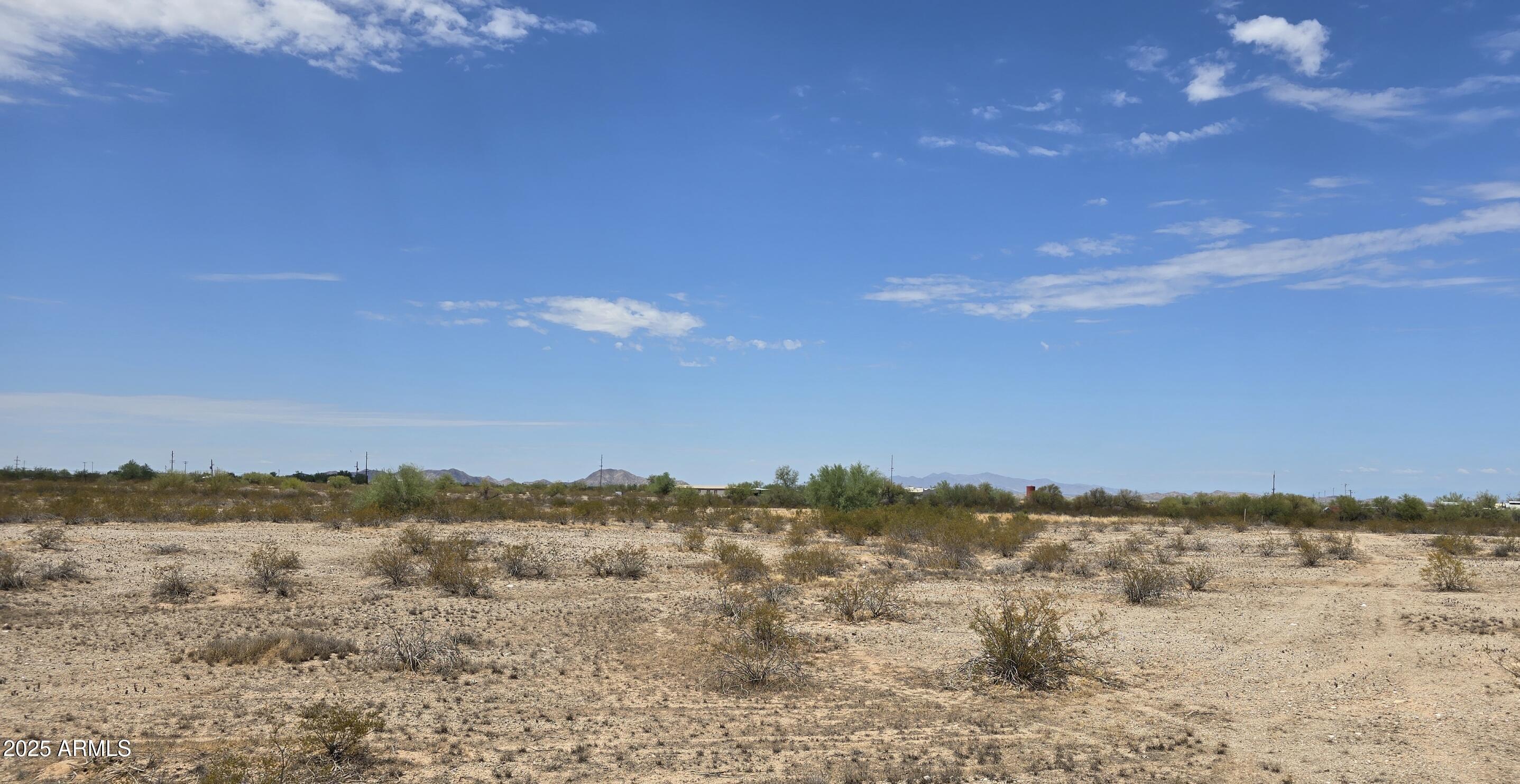 18349 West Mewes Road Buckeye, AZ 85326 - Photo 11 of 14 a view of lake and mountain