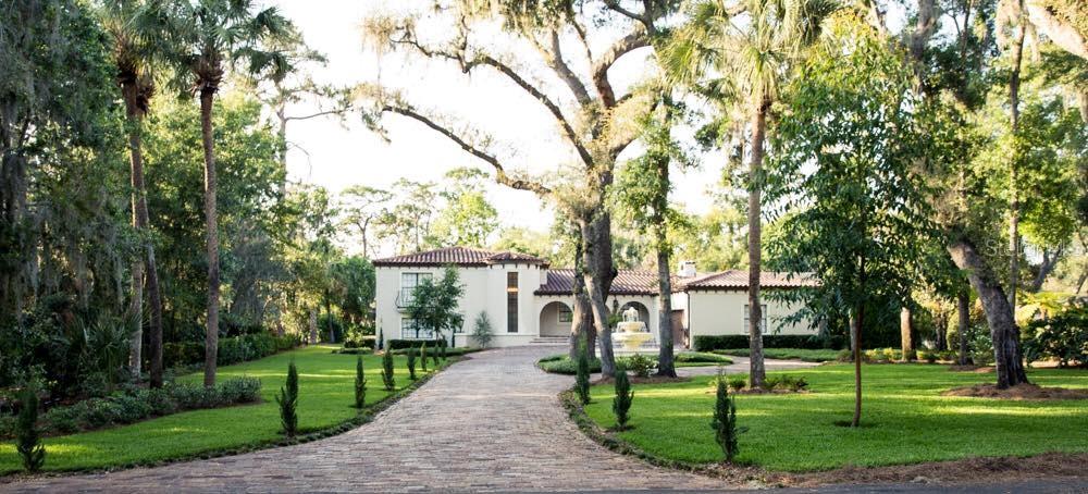 1223 Harbour Island Road Orlando, FL 32809 - Photo 1 of 1 a front view of a house with a yard