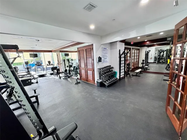 a view of a room with gym equipment