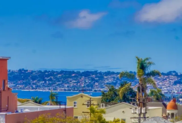 a view of a swimming pool with a lounge chairs