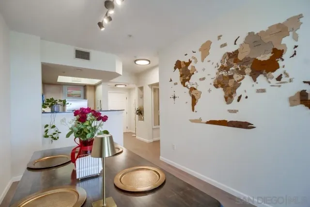 a kitchen with stainless steel appliances granite countertop a sink stove and microwave
