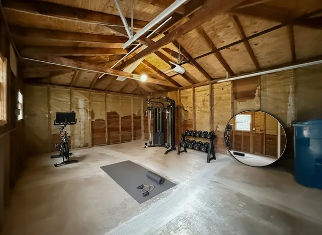 an empty room with closet and a hallway