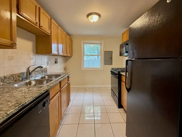 a view of backyard with green space