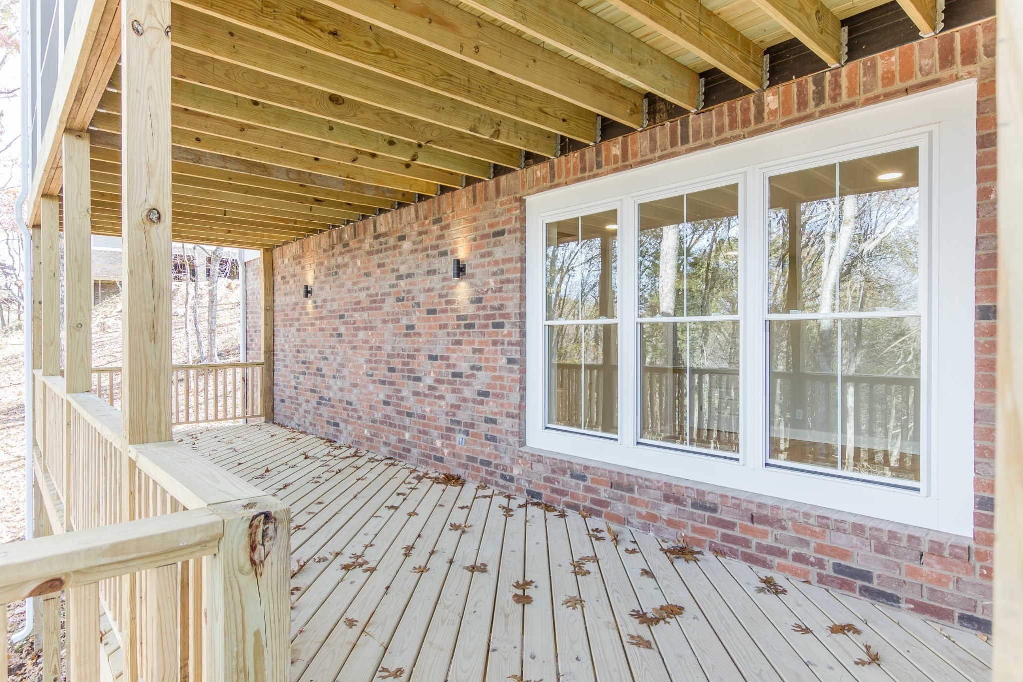 1560 Heller Ridge Spring Hill, TN 37174 - Photo 54 of 55 Lower level open porch with boardwalk to driveway.