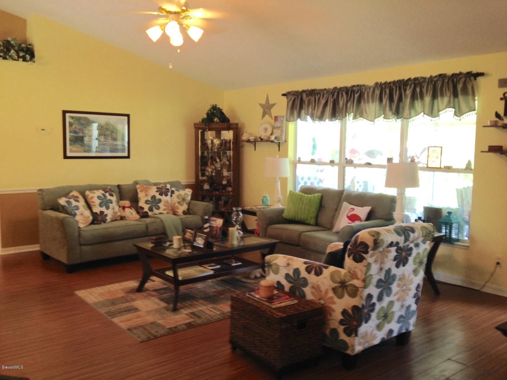 482 Sauders Road Southeast Palm Bay, FL 32909 - Photo 3 of 20 LIVING ROOM VIEW 1
