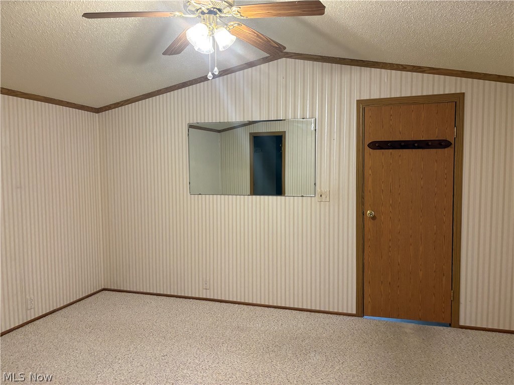 4455 Cleveland Road, Unit 20 Wooster, OH 44691 - Photo 23 of 38 Carpeted bedroom featuring a ceiling fan and ornamental molding
