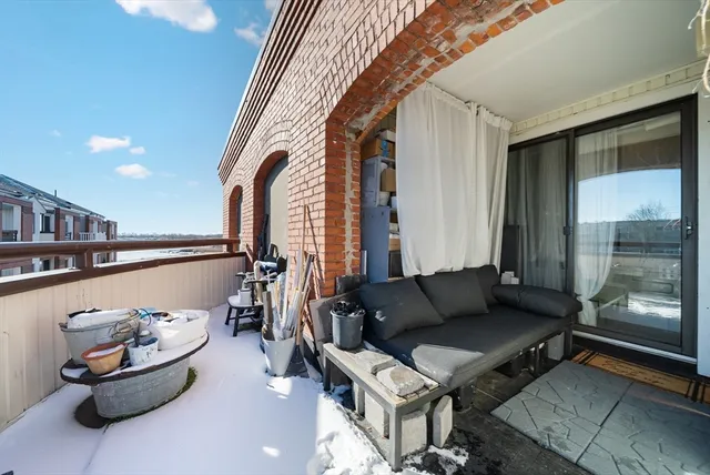 a view of a big room with large windows