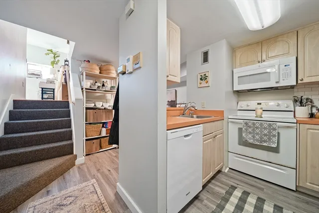 a room with cabinets and a wooden floor