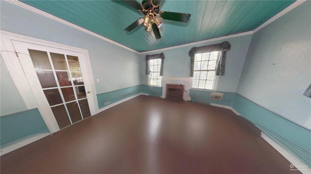 688 Main Street Whitesburg, GA 30185 - Photo 14 of 34 wooden floor in an empty room with a window