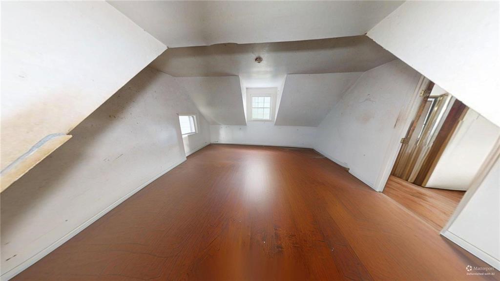 688 Main Street Whitesburg, GA 30185 - Photo 21 of 34 a view of a hallway with wooden floor
