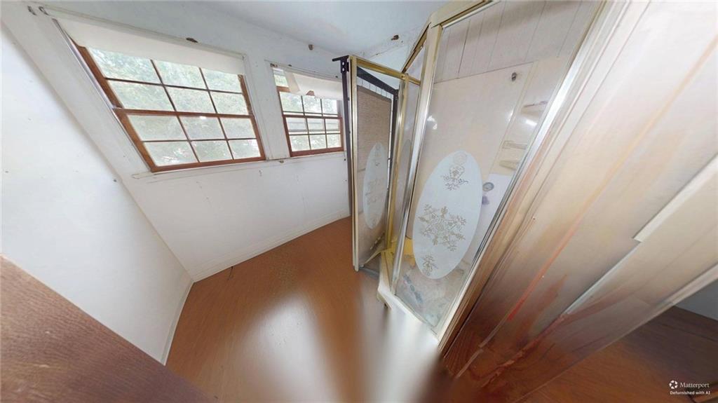 688 Main Street Whitesburg, GA 30185 - Photo 22 of 34 a view of a hallway with wooden floor and entryway